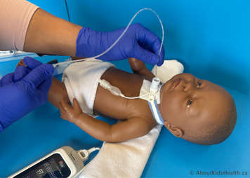 Suctioning child's tracheostomy tube