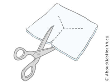 Cutting a y-shape into a square of gauze