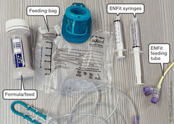 supplies including formula/feed, feeding bag, ENFit syringes, ENFit feeding tube