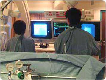 Medical professionals in a catheterization lab