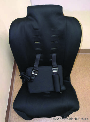 Spirit Spica car seat with no sides to allow space for legs of child in hip spica cast