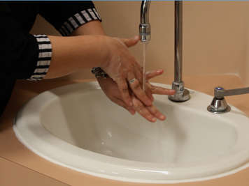 Caregiver washing their hands