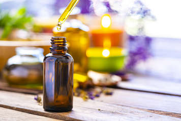 Bottle of essential oils with dropper