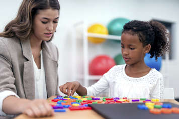 Testing child using coloured blocks