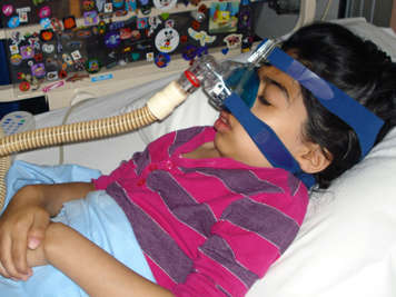 Child using a PAP device